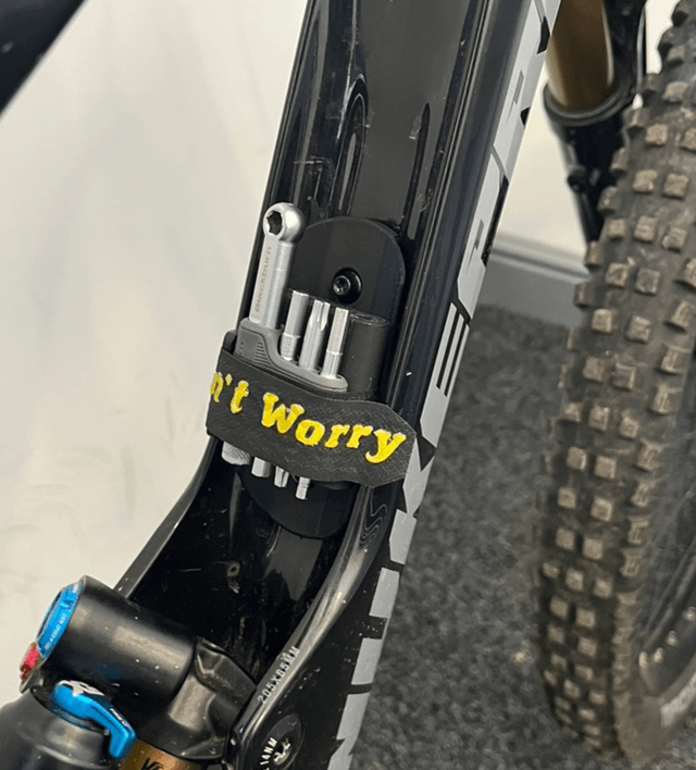 Bottle cage strap mount
