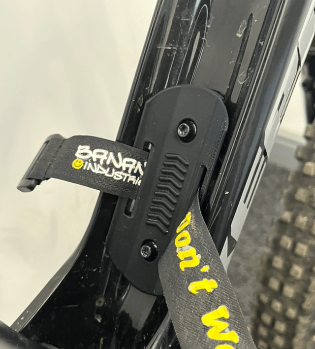 Bottle cage strap mount