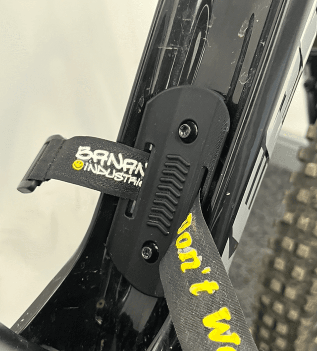 Bottle cage strap mount